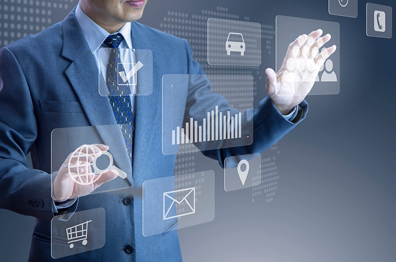 Person holding laptop in office environment